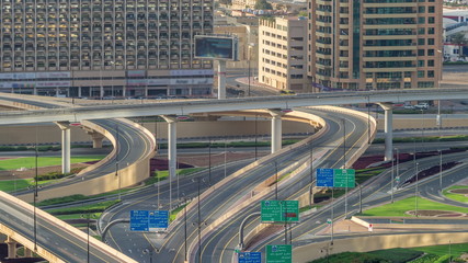 Aerial view of highway interchange in Dubai downtown timelapse.