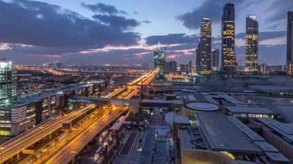 Aerial view of Financial center road night to day timelapse with under construction building