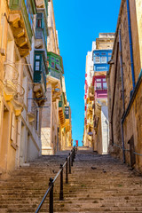Fototapeta na wymiar Long staircase in Valletta, Malta