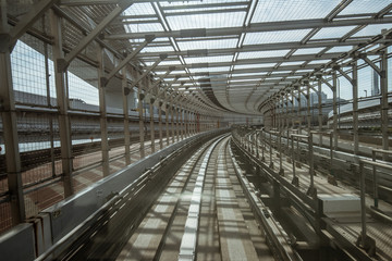 tunnel of monorail road view from front window of a moving train running