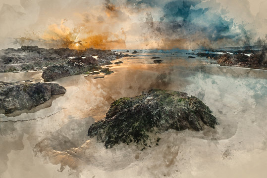 Digital watercolour painting of Stunning sunset landscape image of Freshwater West beach on Pembrokeshire Coast in Wales