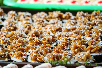 sushi shellfish and shrimp and seafood and various on street food in pattaya city of thailand