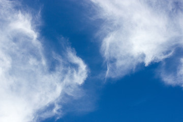 Naklejka na ściany i meble White cloudy with blue sky background