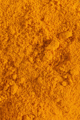 Macro close-up of turmeric powder