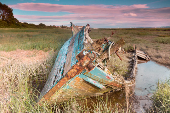 Fishing boat wrecks in the mud at Heswall