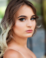 Portrait of Beautiful Young Caucasian Girl with Barbell septum Nose Ring. Horseshoe Nose Ring. 