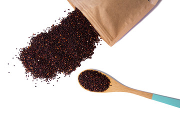 Raw brown seeds quinoa closeup isolated at white background