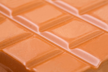 Delicious chocolate bar in a studio closeup