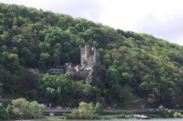 Fototapeta na wymiar Rheinstein Castle, Germany - 27 April 2019: View of the Castle in the hill Over the Rhine river