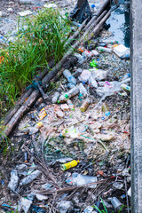Ecology watercourse river canal with garbage and plastic