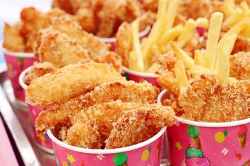 French fries and fried chicken at market