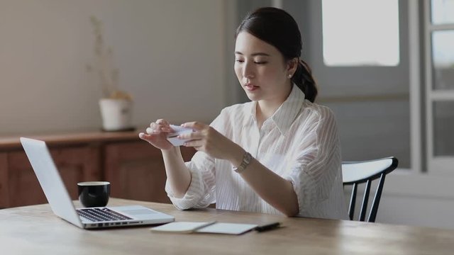 Close up of young woman memorizing notes