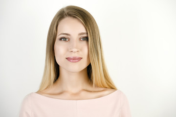 Fototapeta premium young beautiful blonde woman on isolated white background