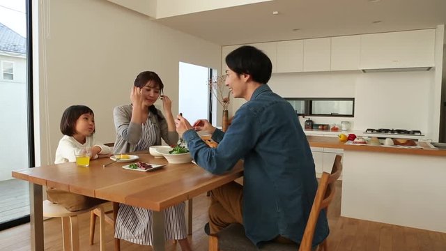 Close&not;&dagger;up&not;&dagger;of family having healthy dinner