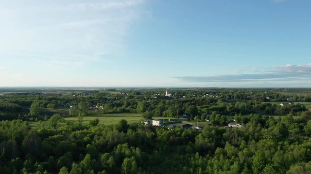 Rural Canadian Town Surrounded By Farm Fields And Dense Woods. Flat Terrain And A Farming Community In Ontario.