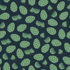 Spotty eggs on dark blue background. Seamless vector pattern.