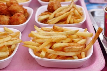 French fries and fried chicken at market
