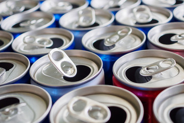 Empty aluminium drink cans recycling background concept