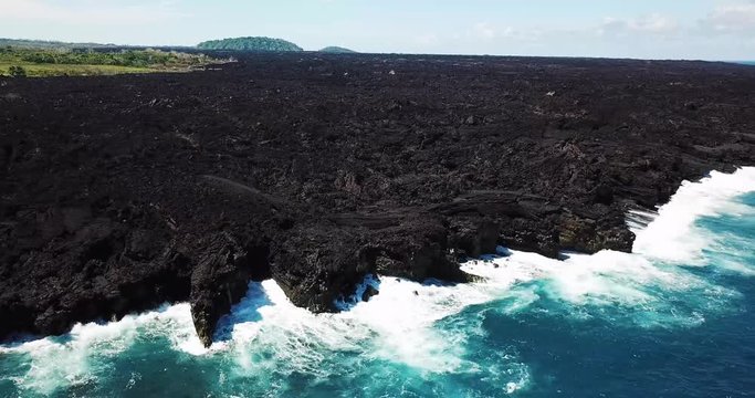 Puna Eruption Lava From Kilauea Volcano in Hawaii Meets Ocean Near Issac Hale Beach Park - Aerial View Moving Left to Right. 4k.