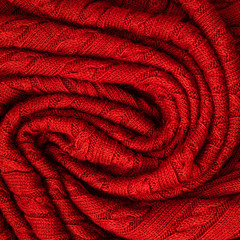 Fototapeta na wymiar Background made of knitted ornament texture. Macro photo.
