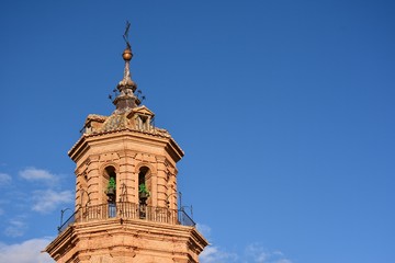 Fototapeta na wymiar Detalle torre - campanario de la iglesia Mayor de Baza, Granada, España 