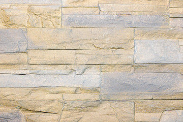 The texture of natural stone is made like brickwork. It has beautiful shades and shapes of stone.