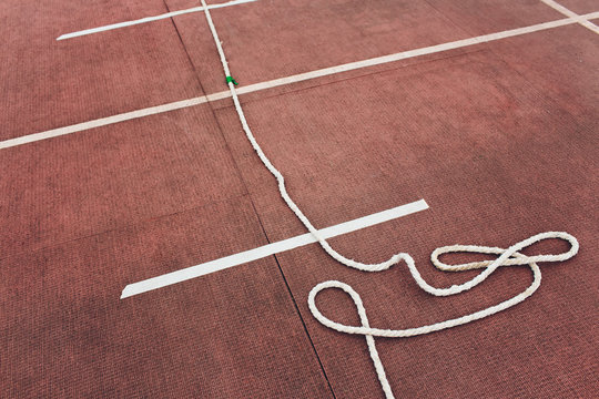 People playing tug of war during obstacle training course in boot camp. - Powered by Adobe