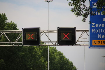 Red crosses above closed driving lanes on Highway A20 at Nieuwerkerk aan den IJssel, closed for...