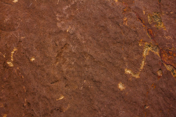 Brown stone surface or stone texture as background