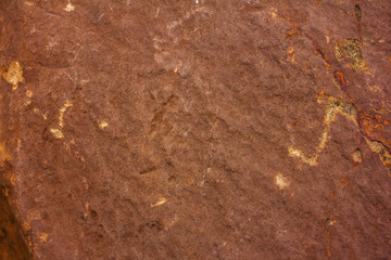 Brown stone surface or stone texture as background