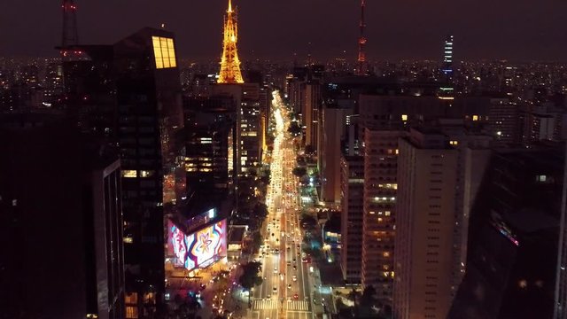 Illuminated nightlife view of Paulista Avenue, Sao Paulo city, Brazil.Illuminated nightlife view of Paulista Avenue, Sao Paulo city, Brazil.Illuminated nightlife view of Paulista Avenue, Sao Paulo.