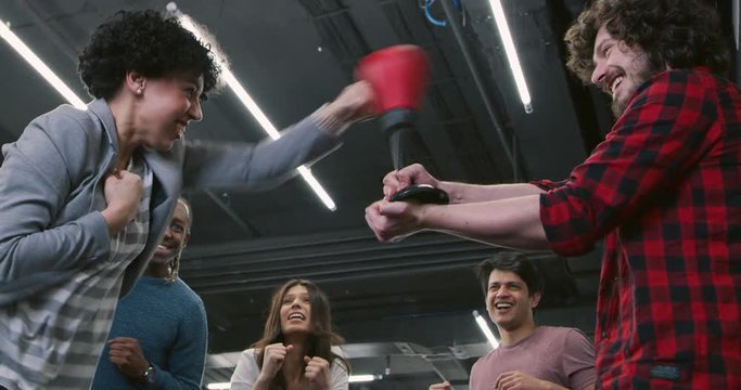 Young multiethnic business team of software developers working together using