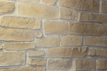 The texture of natural stone is made like brickwork. It has beautiful shades and shapes of stone.