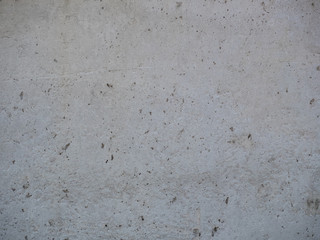 texture of gray concrete wall with scratches close up