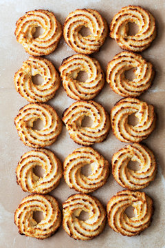 Coconut macaroons in rows.