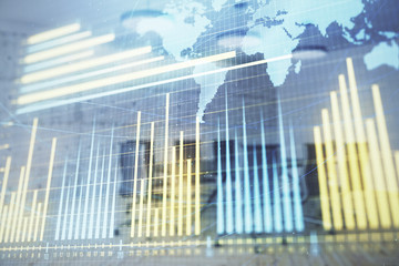 Double exposure of stock market graph with globe hologram on conference room background. Concept of international finance