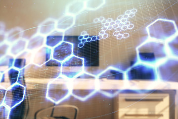 Technology theme hologram and desktop office computer background. Double exposure. Concept of high technology