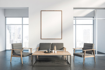 Spacious white living room interior with poster