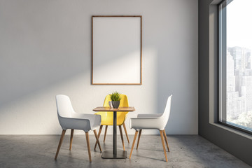 White cafe interior with poster