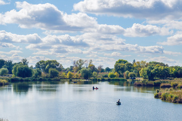 Beautiful summer landscape with a river and blue sky.