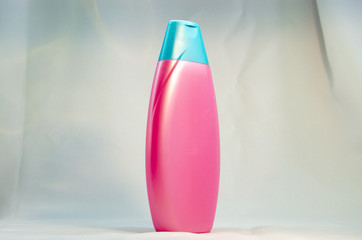 shampoo paraben free pink bottle on a white background