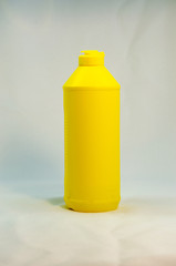 shampoo paraben free yellow bottle on a white background