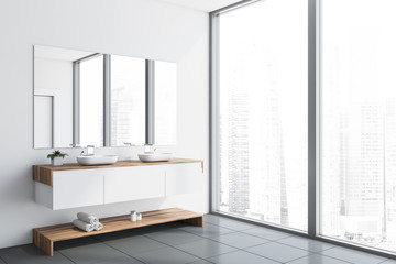 White panoramic bathroom corner with sink