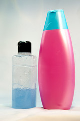 shampoo paraben free yellow and blue bottle on a white background