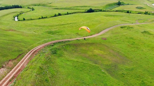 View from above on the flight of the paraglider