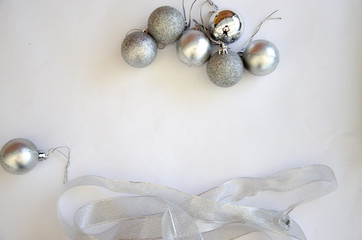 Obraz na płótnie Canvas 2020 Christmas balls silver on a white background Christmas frame