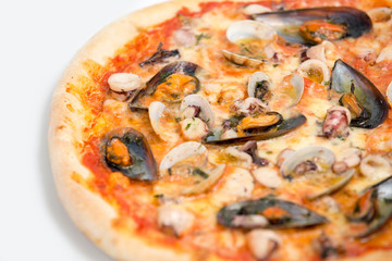 Italian pizza with seafood on white background.Selective focus