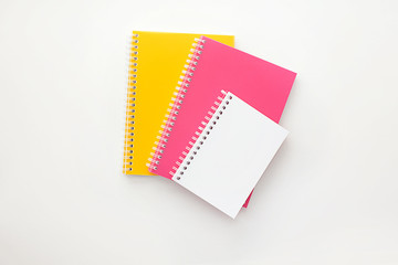 notebooks multicolored white background