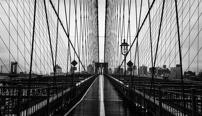 None on Brooklyn Bridge in New York City, Manhattan closeup with skyscrapers and city skyline over Hudson River. - obrazy, fototapety, plakaty