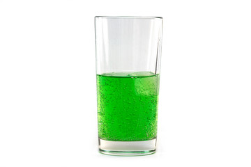 Natural green sparkling Soda in Glass with Ice isolated on white Background 